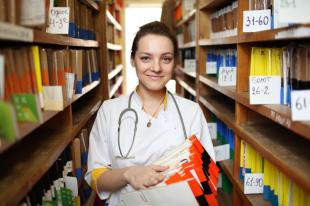 Nurse with Medical Files